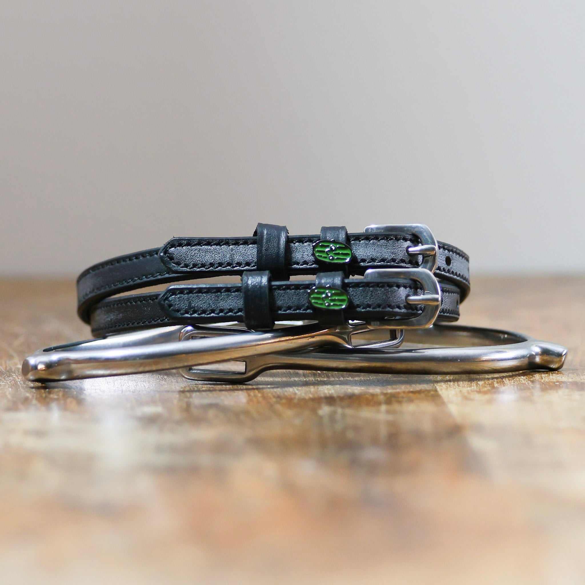 ManeJane Pickles Spur Straps Spur Straps — black leather, non-stretch, hero image for English riders.