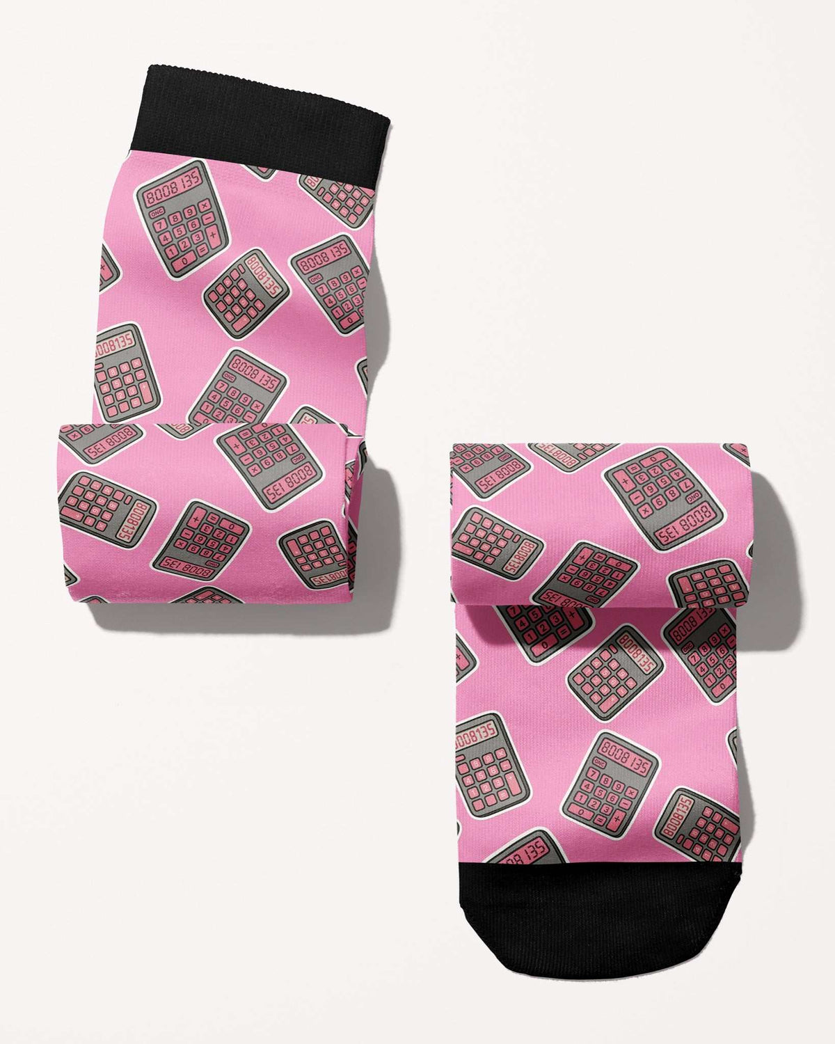 Boobies Limited Edition boot socks, calculator print on pink, rolled, showing the pattern repeat, by Dreamers & Schemers
