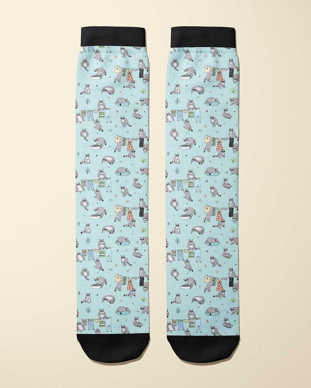 Limited edition Masked Bandit boot socks with playful raccoon design, soft and stretchy, made in USA