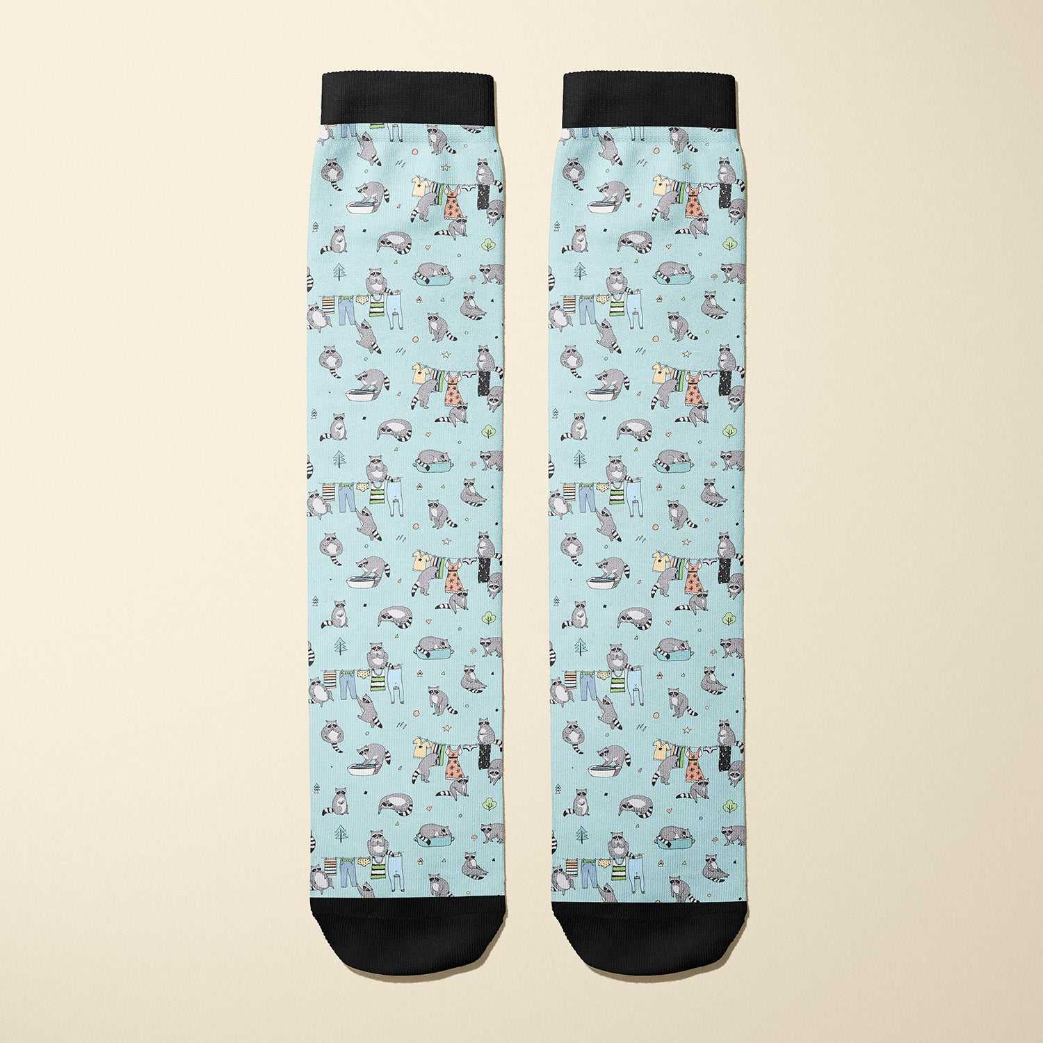 Limited edition Masked Bandit boot socks with playful raccoon design, soft and stretchy, made in USA