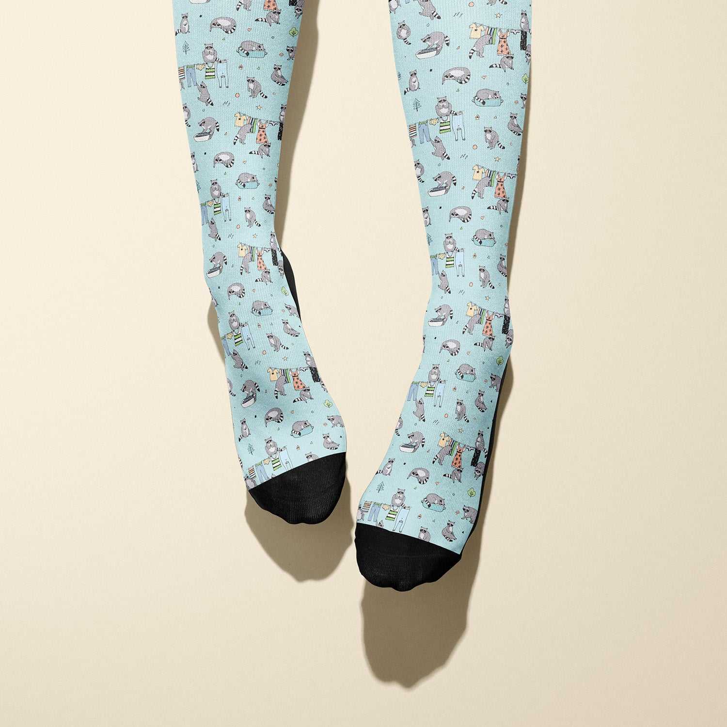 Limited edition Boot Socks with playful masked bandit raccoon design, soft and stretchy, made in USA