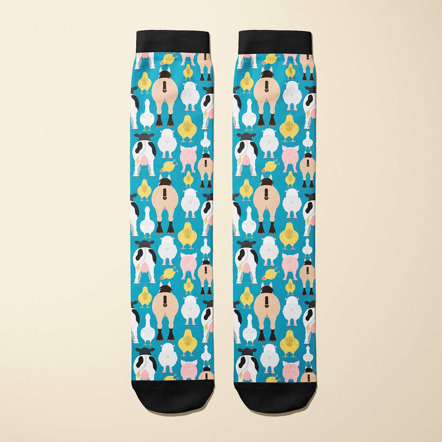 Limited edition Farm Butts 2023 boot socks featuring cheeky farm animal designs, made in the USA.