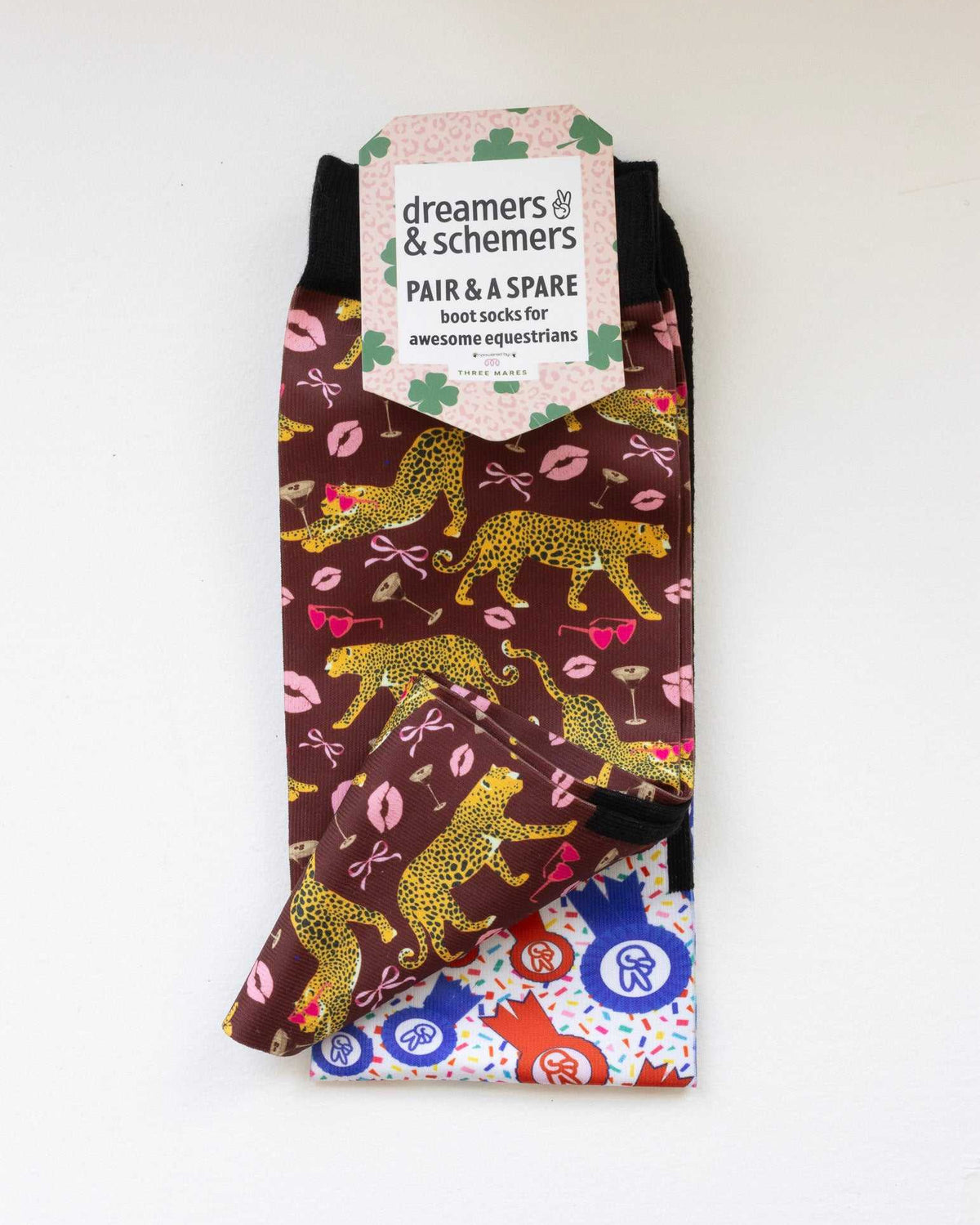 Ready to Play boot socks shown folded with the included spare sock and printed cuff detail