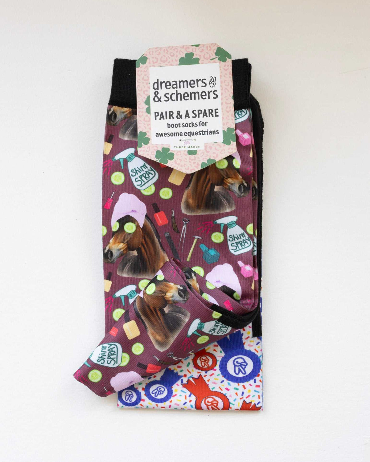 Mani Pedi boot socks shown folded with the included spare sock and printed cuff detail