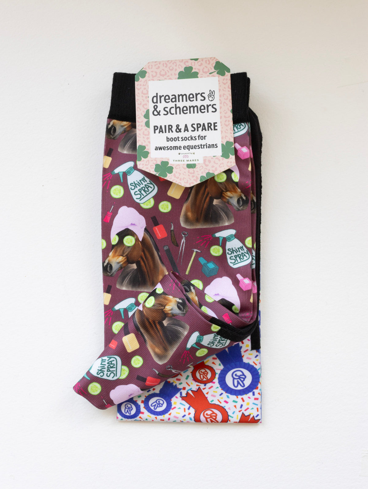Mani Pedi boot socks shown folded with the included spare sock and printed cuff detail