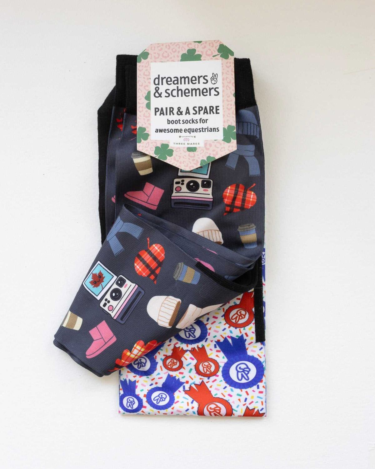 Sept Starter Pack boot socks shown folded with the included spare sock and printed cuff detail