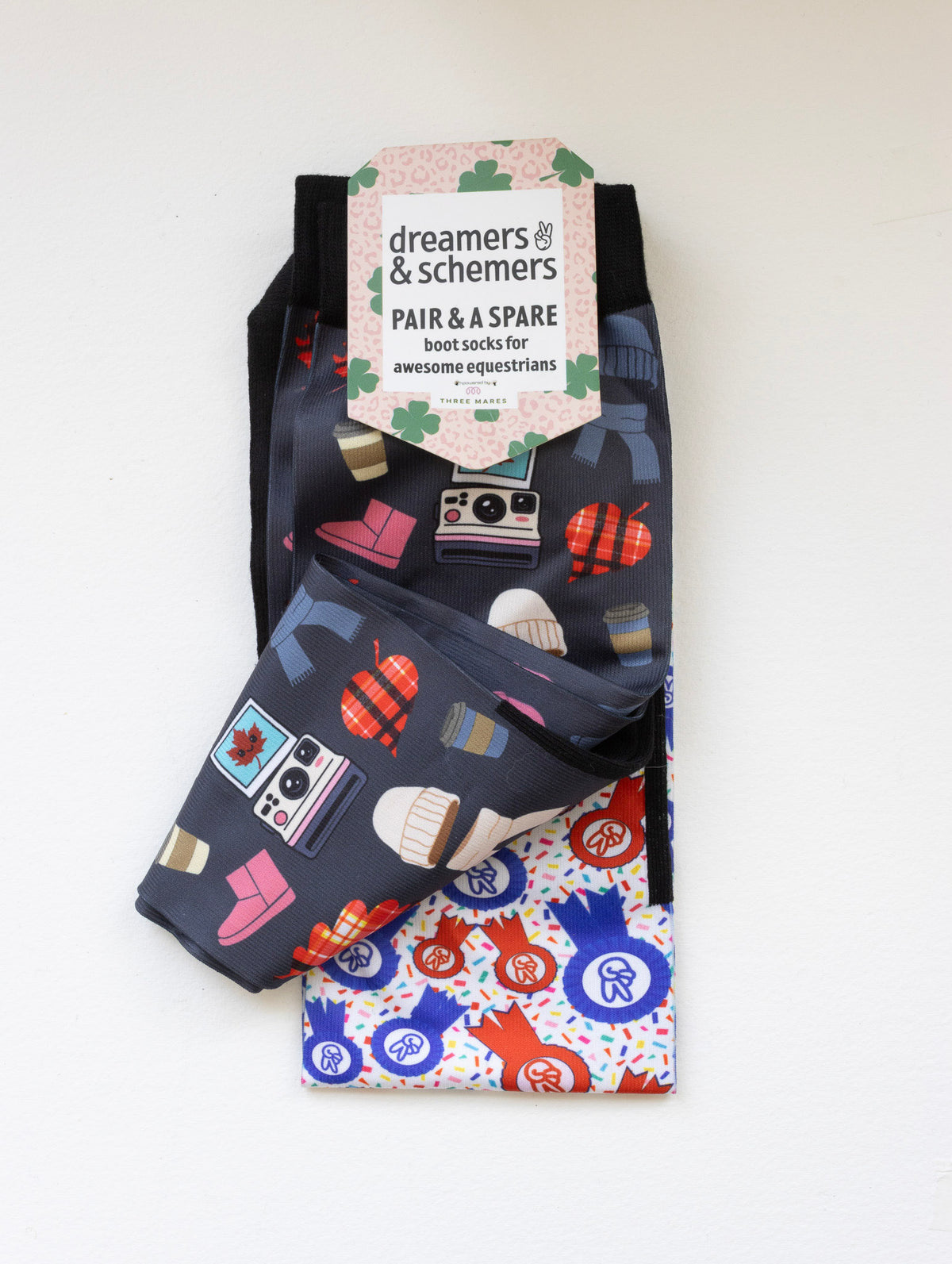 Sept Starter Pack boot socks shown folded with the included spare sock and printed cuff detail