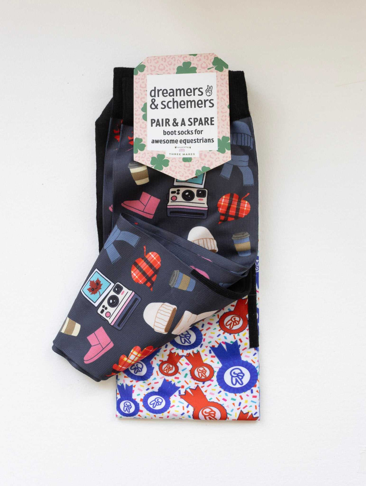 Sept Starter Pack boot socks shown folded with the included spare sock and printed cuff detail