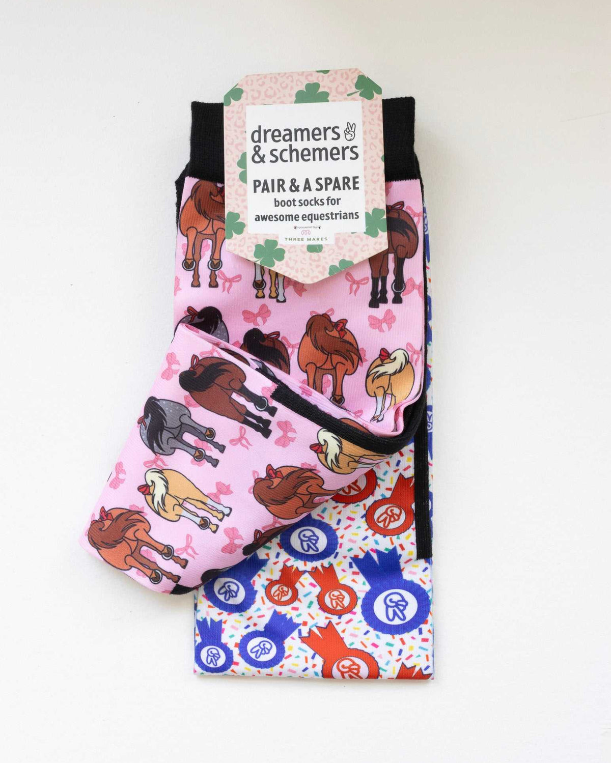 Red Ribbon Girlies boot socks shown folded with the included spare sock and printed cuff detail