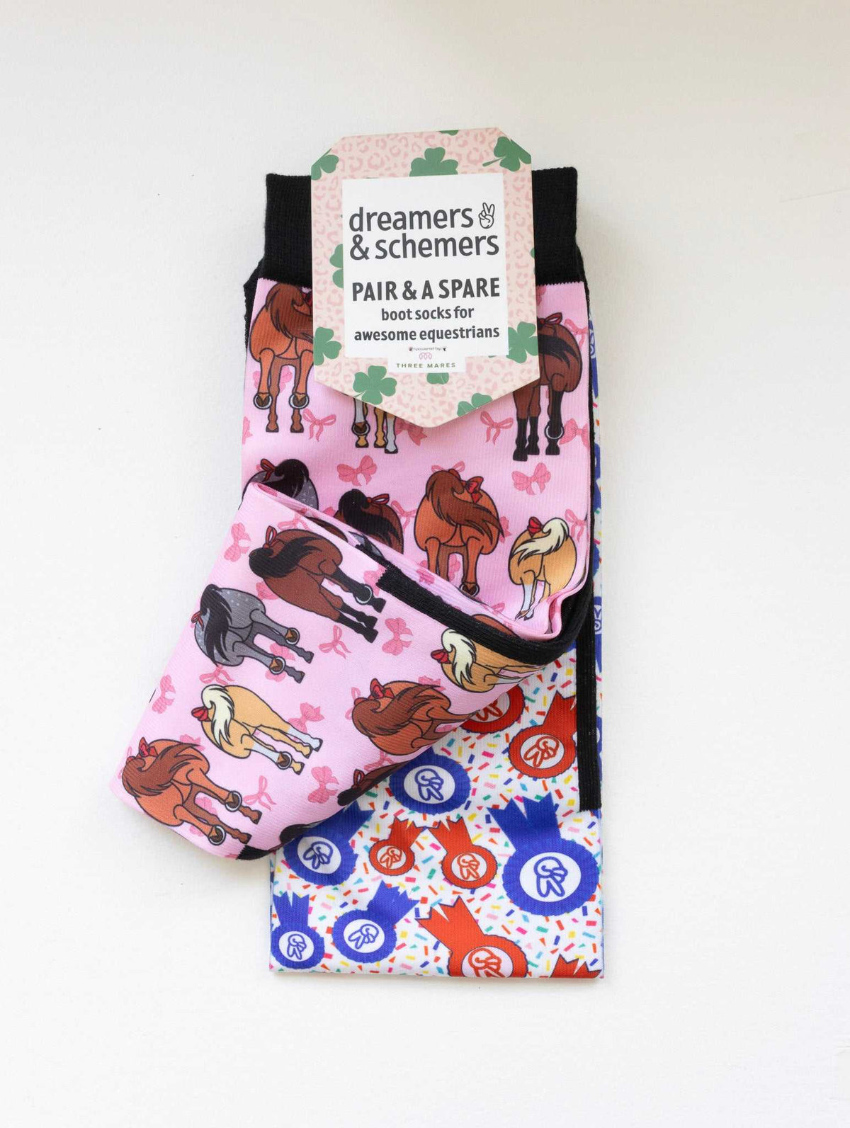 Red Ribbon Girlies boot socks shown folded with the included spare sock and printed cuff detail
