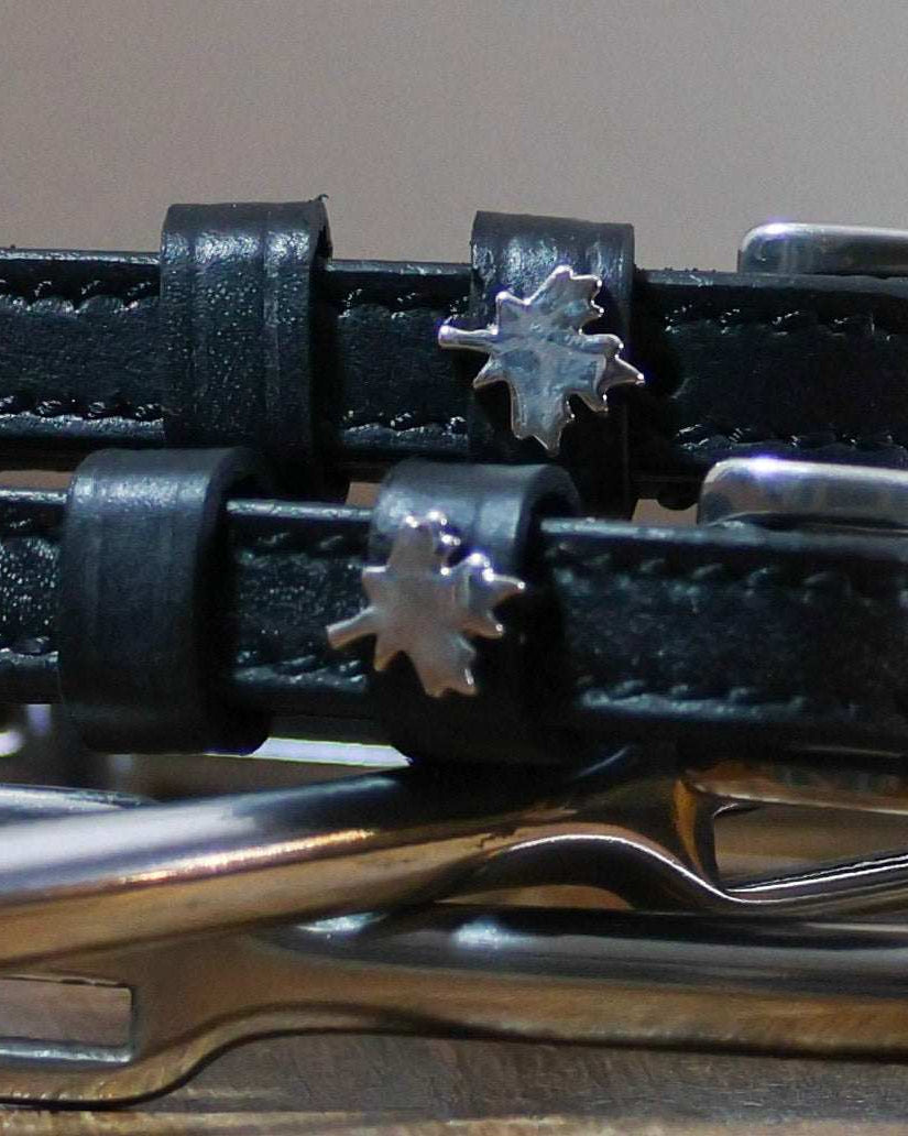 Black leather Canada spur straps with silver maple leaf charm and stainless steel buckles