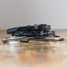 ManeJane More Leg Spur Straps Spur Straps — black leather, non-stretch, hero image for English riders.