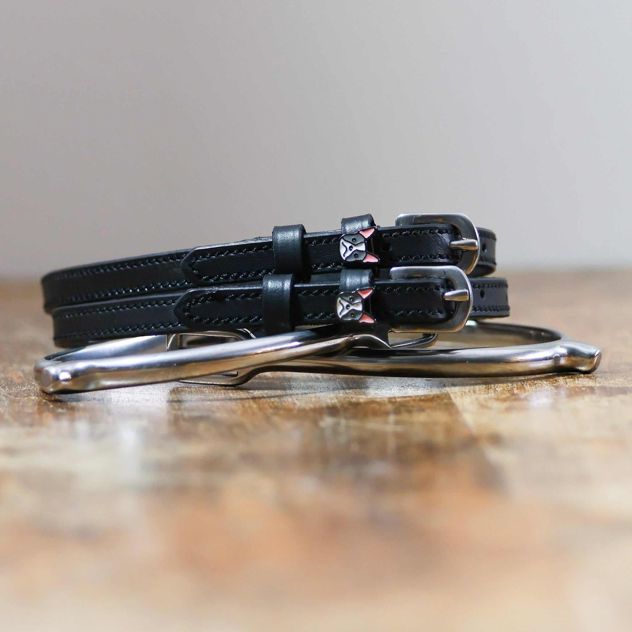 ManeJane Dog - Frenchie Spur Straps Spur Straps — black leather, non-stretch, hero image for English riders.
