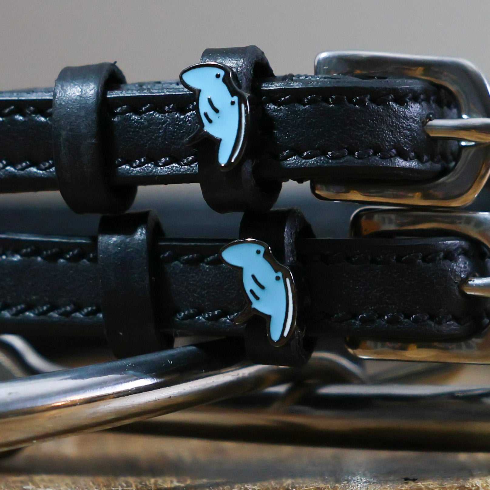 Black leather stingray spur straps with stainless steel buckle and custom charm
