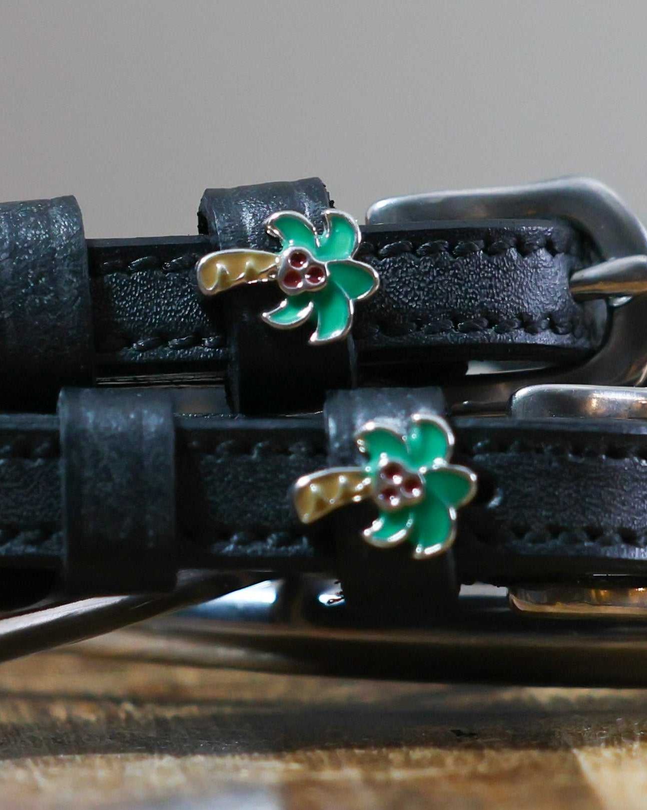 Black leather Palm Tree Spur Straps with green palm tree charm and stainless steel buckles