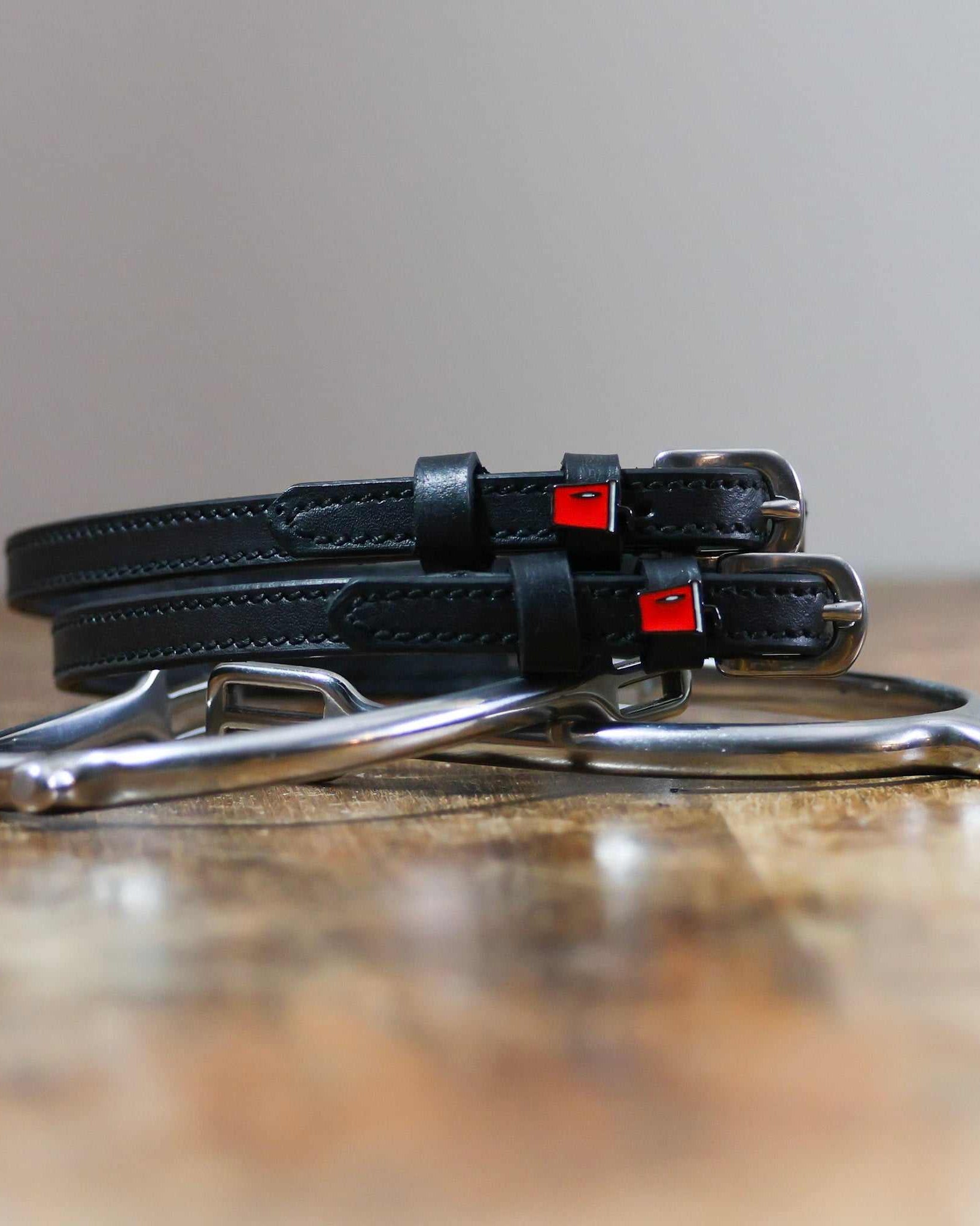 ManeJane Soda Spur Straps Spur Straps — black leather, non-stretch, hero image for English riders.