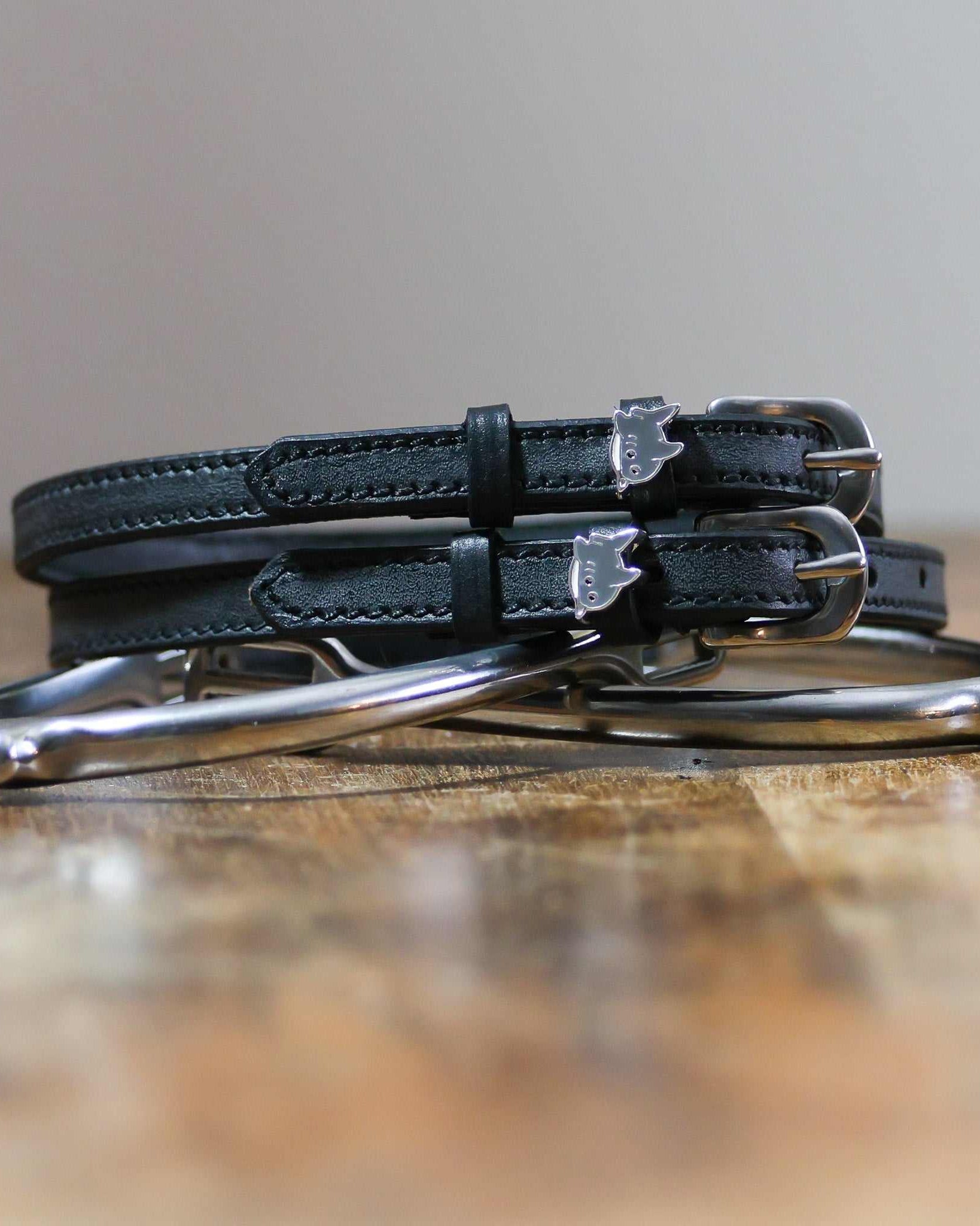 ManeJane SHARK 🦈 Spur Straps Spur Straps — black leather, non-stretch, hero image for English riders.