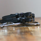 ManeJane D-Ring Spur Straps Spur Straps — black leather, non-stretch, hero image for English riders.