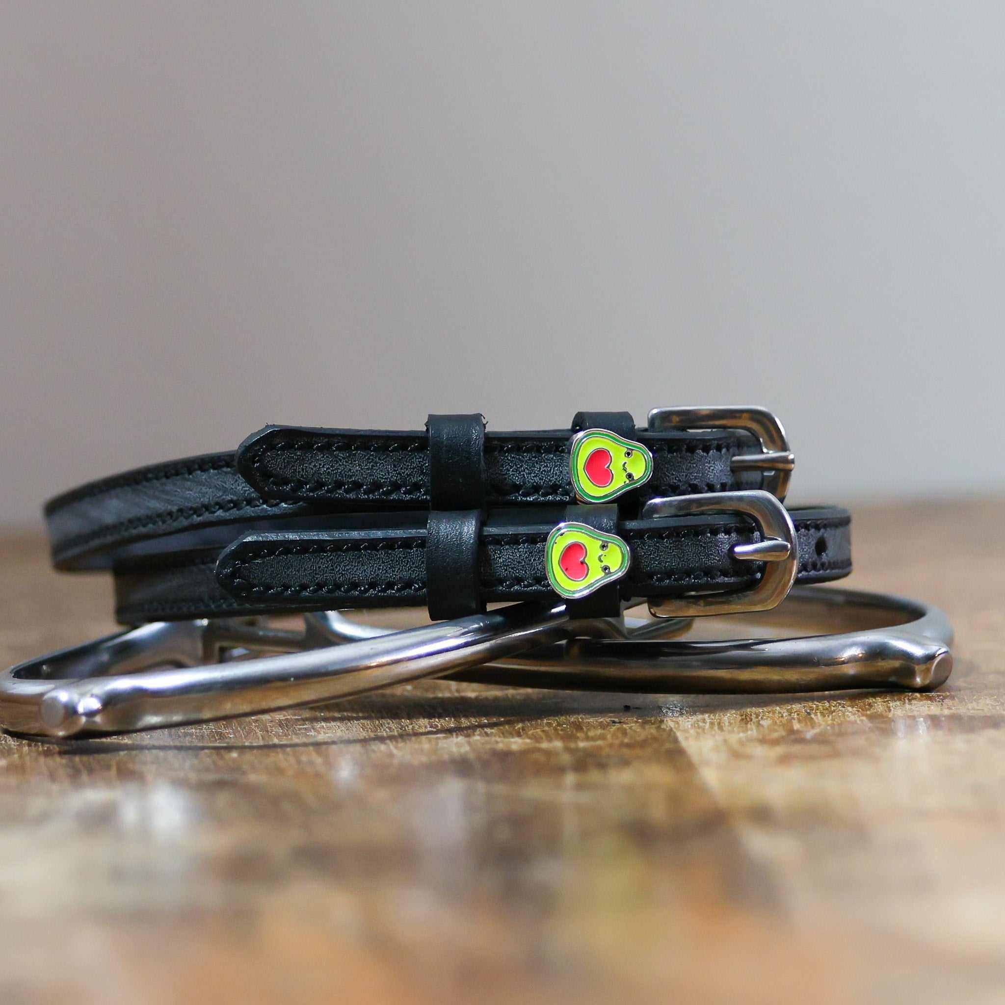 ManeJane Happy Avocado Spur Straps Spur Straps — black leather, non-stretch, hero image for English riders.