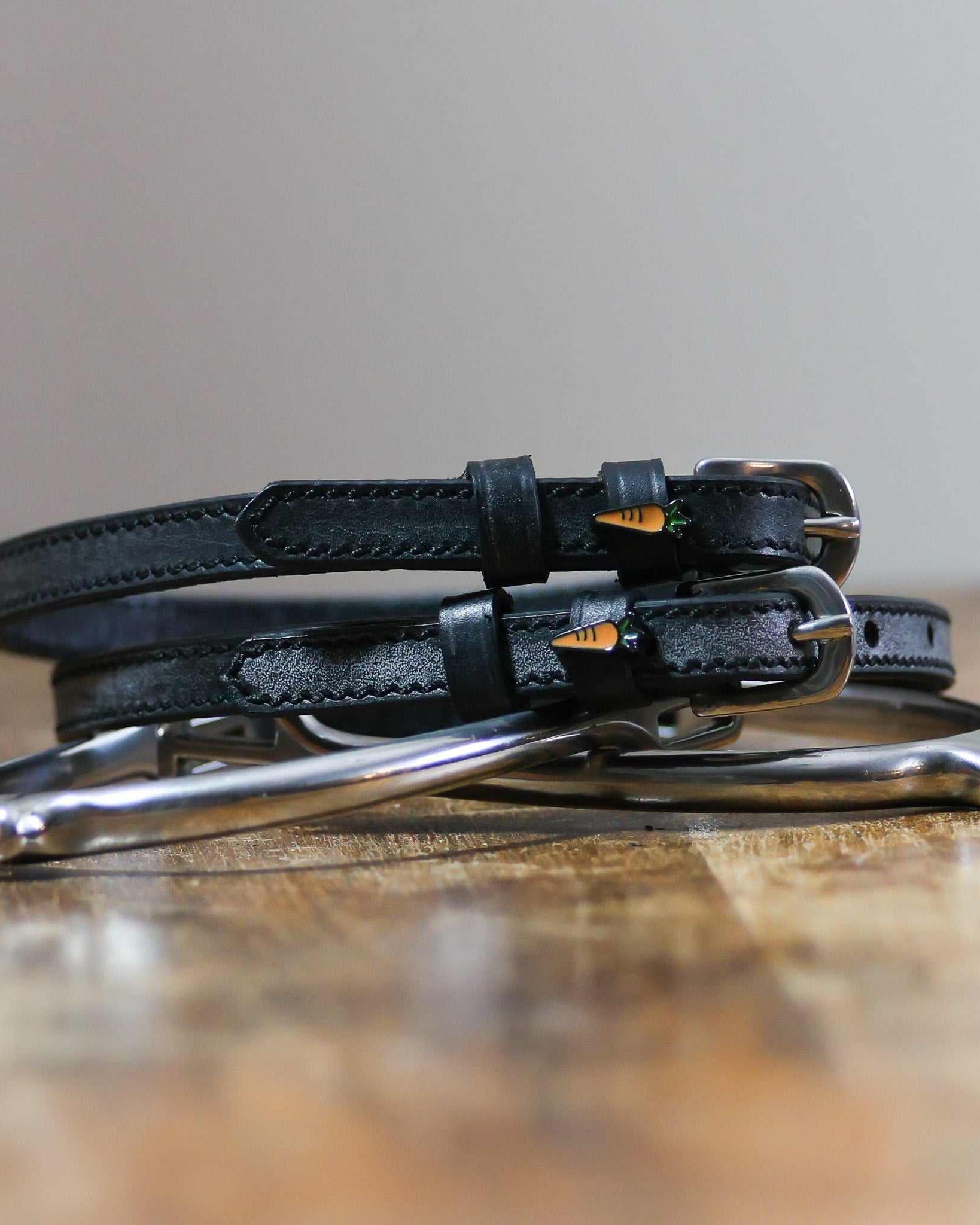 ManeJane Carrot Spur Straps Spur Straps — black leather, non-stretch, hero image for English riders.