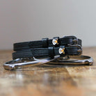 ManeJane Friendly Fox Spur Straps Spur Straps — black leather, non-stretch, hero image for English riders.