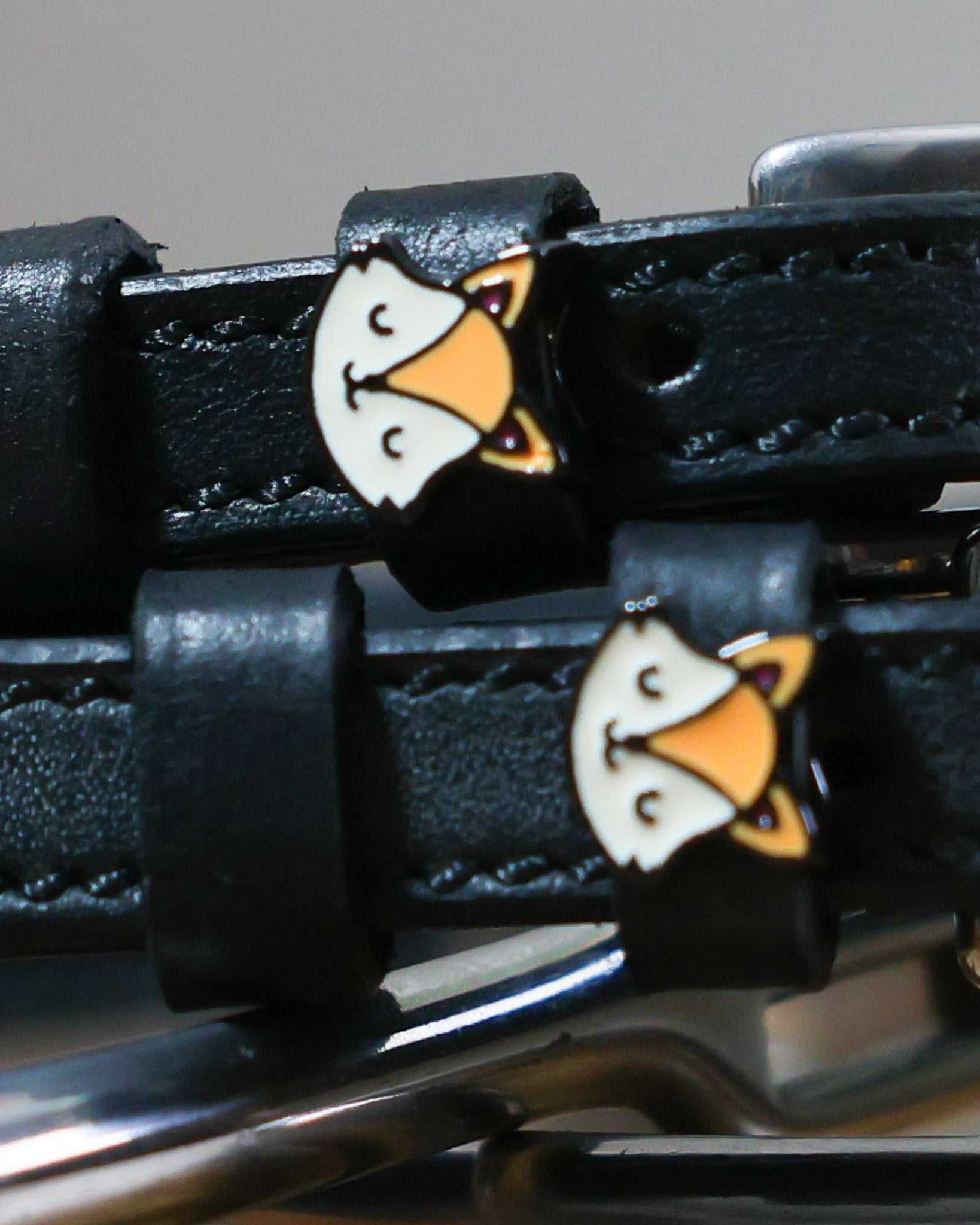 Friendly Fox Spur Straps black leather with stainless steel buckle and fox charm close-up