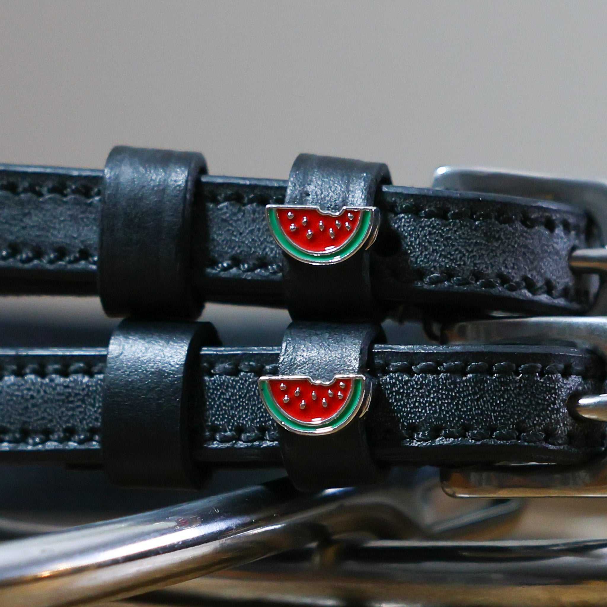 Black leather Watermelon Spur Straps with stainless steel buckles and watermelon charm