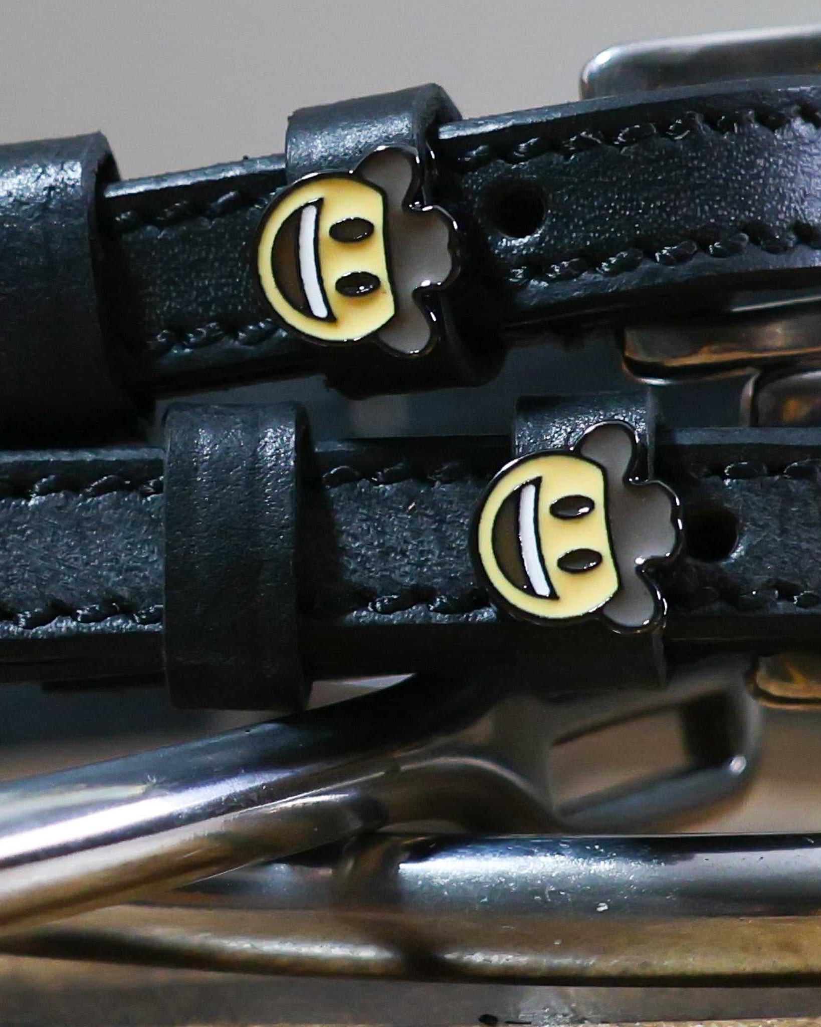 Black leather Cowboy Emoji Spur Strap with stainless steel buckle and custom cowboy hat emoji charm