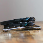 ManeJane Nice Dino Spur Straps Spur Straps — black leather, non-stretch, hero image for English riders.