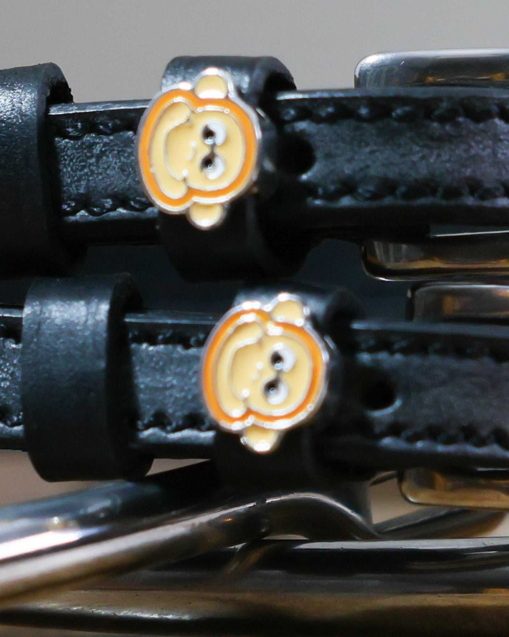 Black leather Monkey Faces Spur Straps with stainless steel buckles and custom monkey face charms