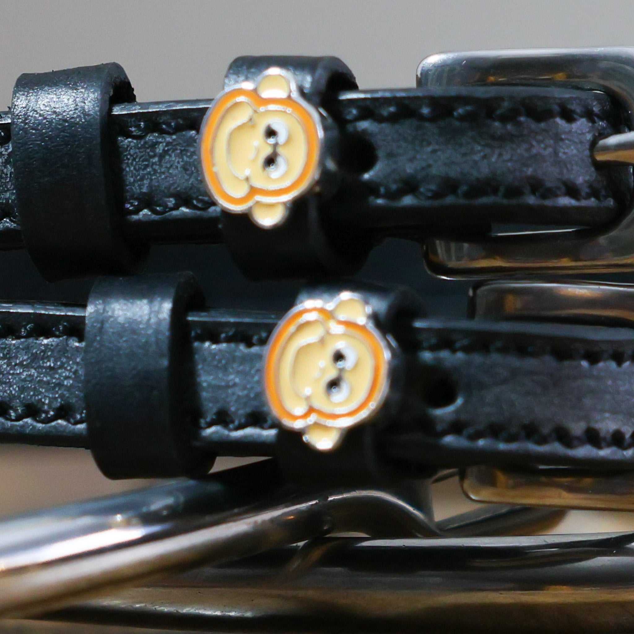 Black leather Monkey Faces Spur Straps with stainless steel buckles and custom monkey face charms