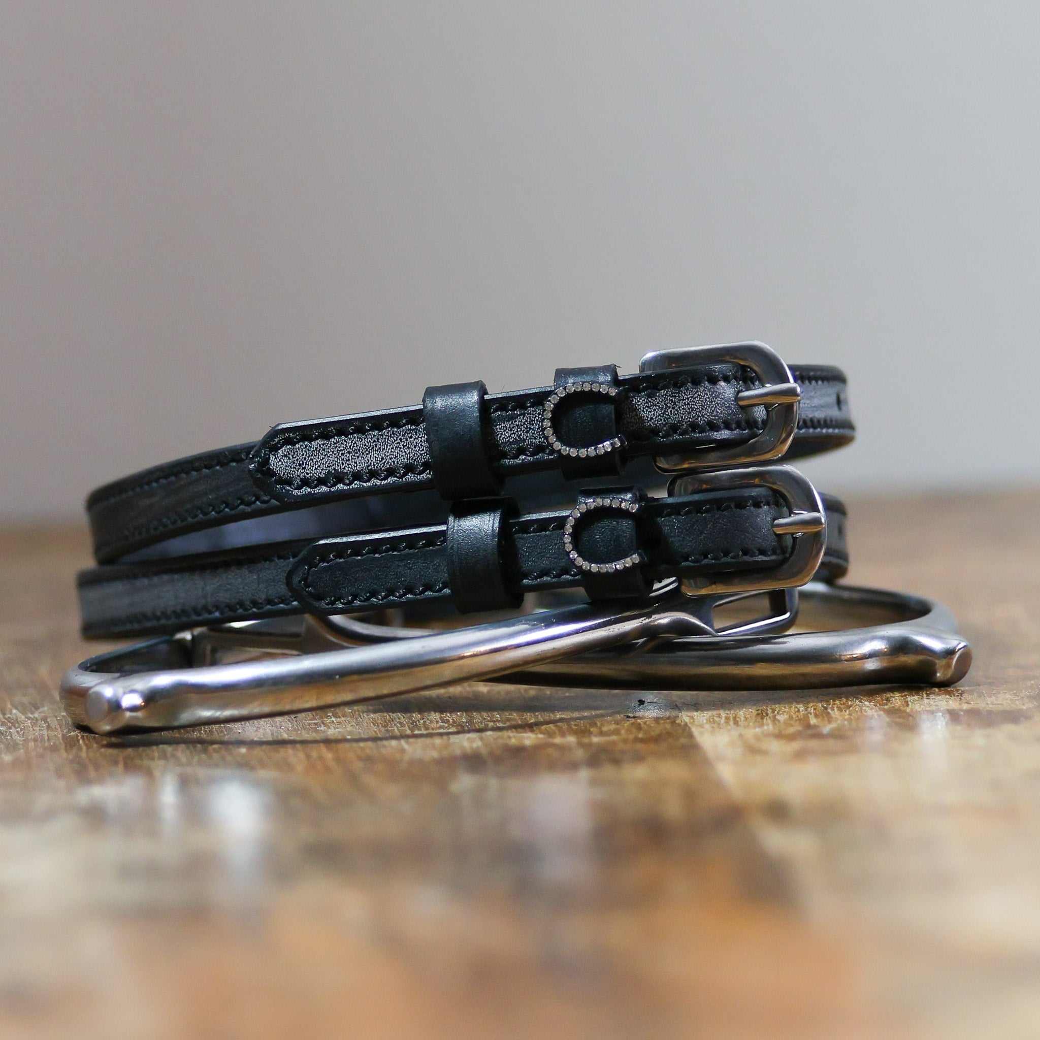 ManeJane Horse Shoes - Silver Bling Spur Straps Spur Straps — black leather, non-stretch, hero image for English riders.
