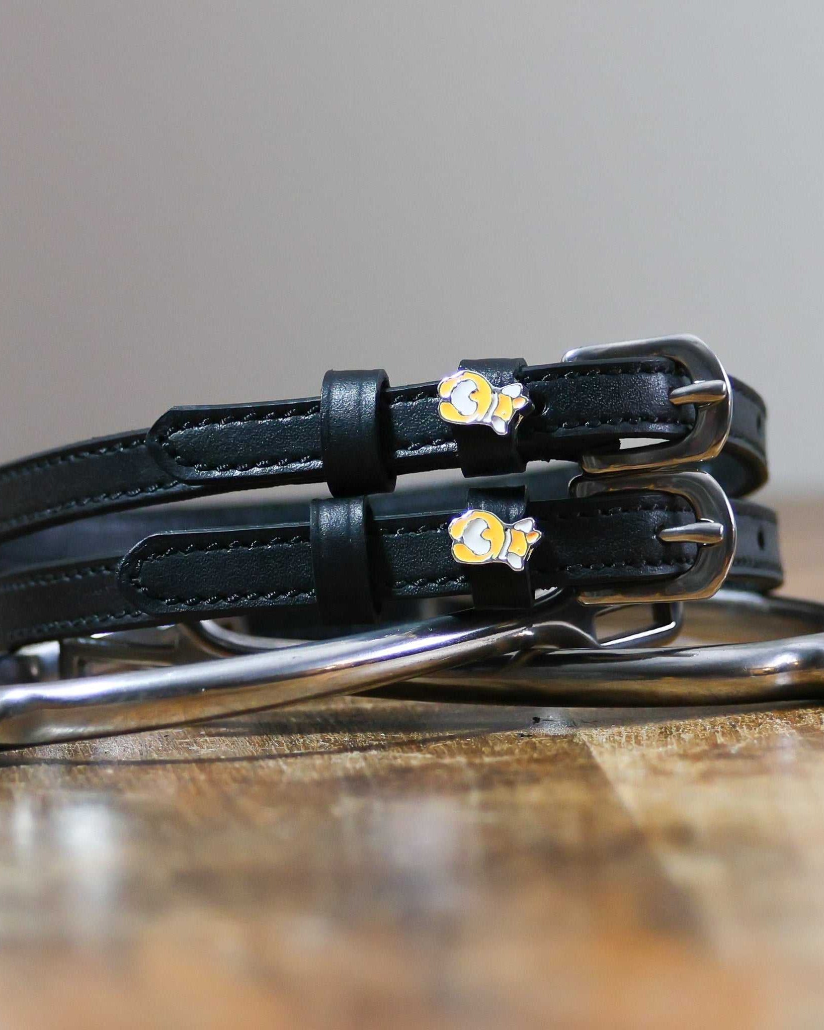 ManeJane Corgi Butts Spur Straps Spur Straps — black leather, non-stretch, hero image for English riders.