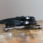 ManeJane Fingers Crossed Spur Straps Spur Straps — black leather, non-stretch, hero image for English riders.