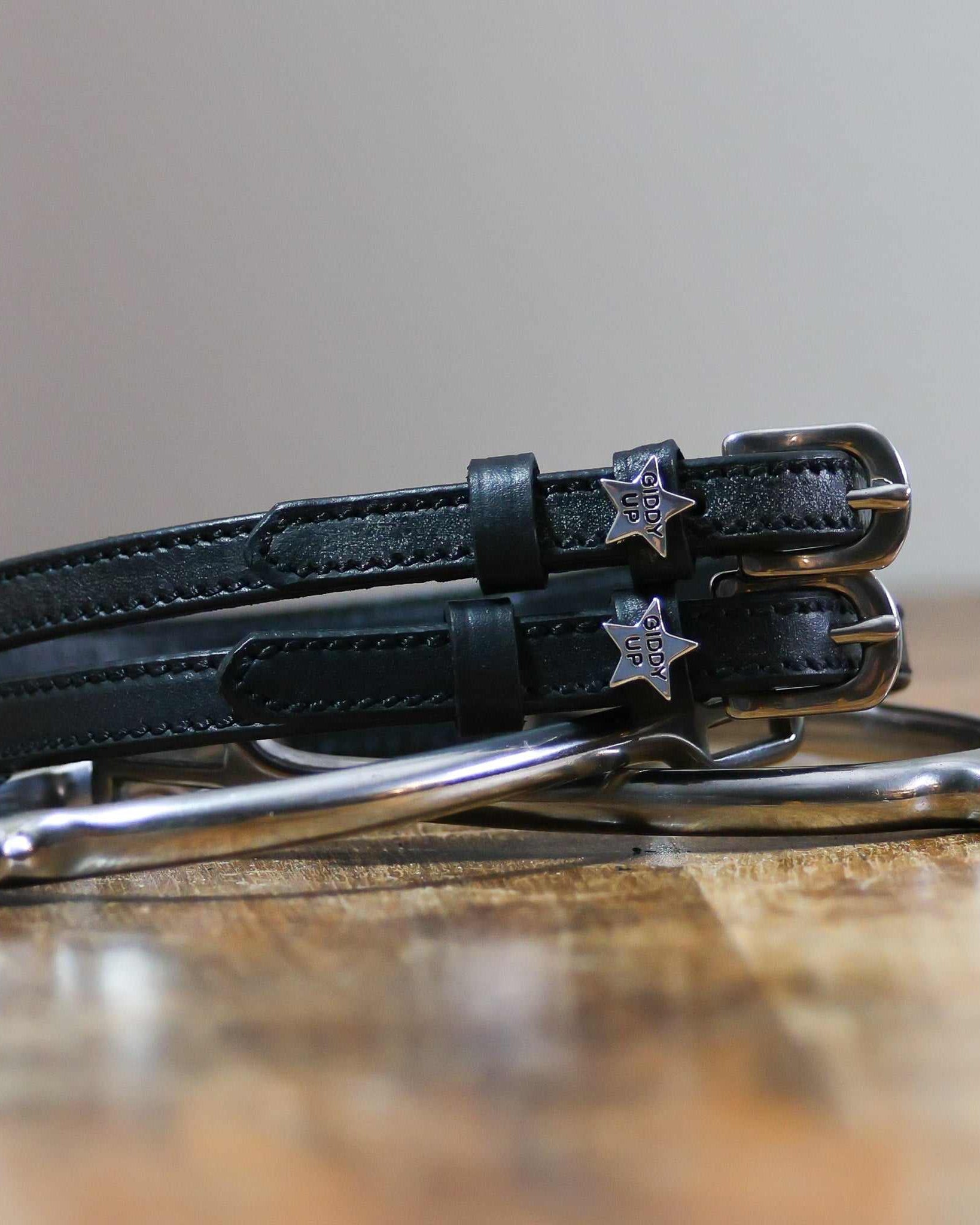 ManeJane Giddy Up Spur Straps Spur Straps — black leather, non-stretch, hero image for English riders.