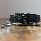 ManeJane Hot Dog Spur Straps Spur Straps — black leather, non-stretch, hero image for English riders.