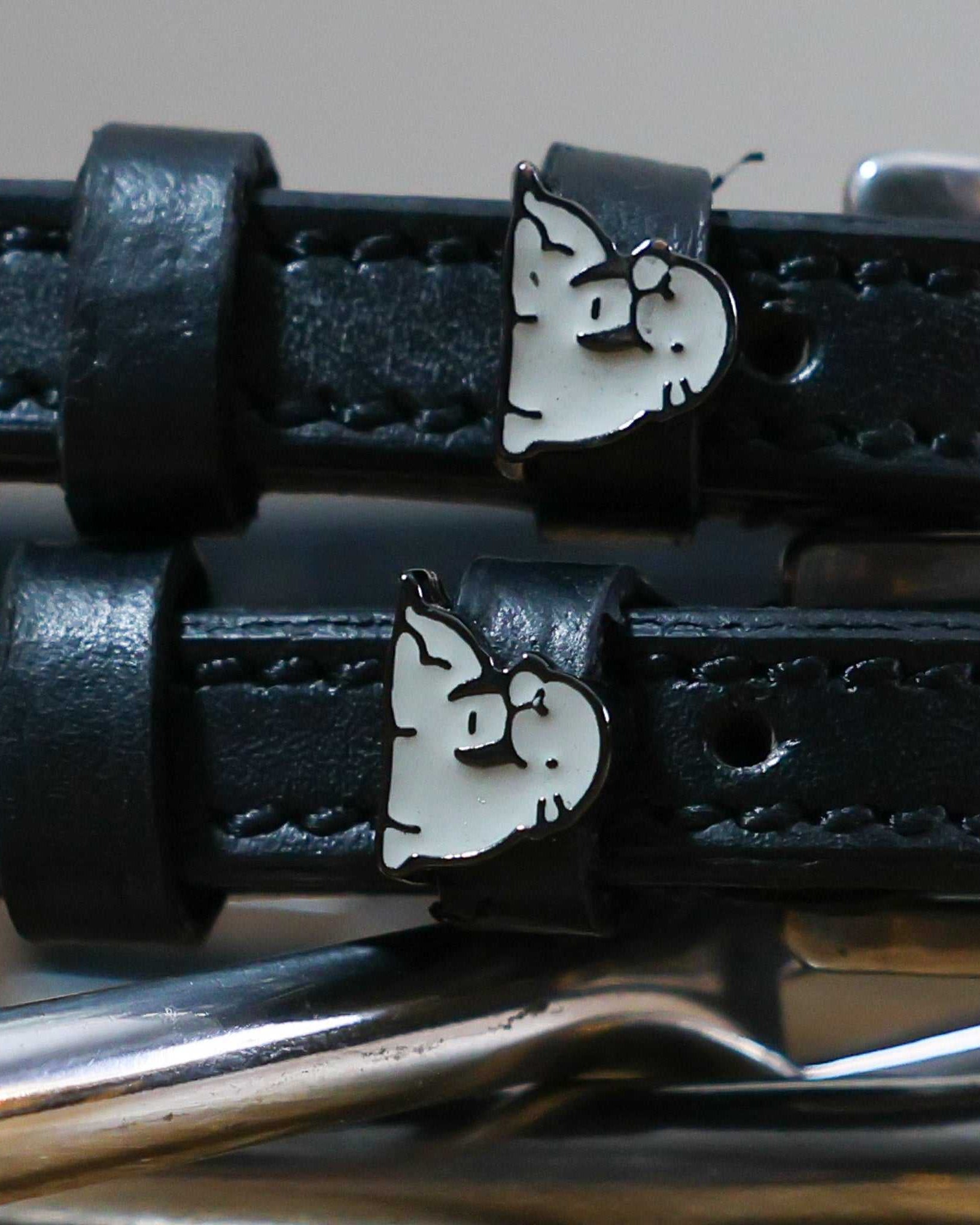 Black leather Walrus Spur Straps with stainless steel buckle and custom walrus charm