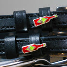 Black leather Hot & Spicy Spur Straps with custom chili pepper charm and stainless steel buckle