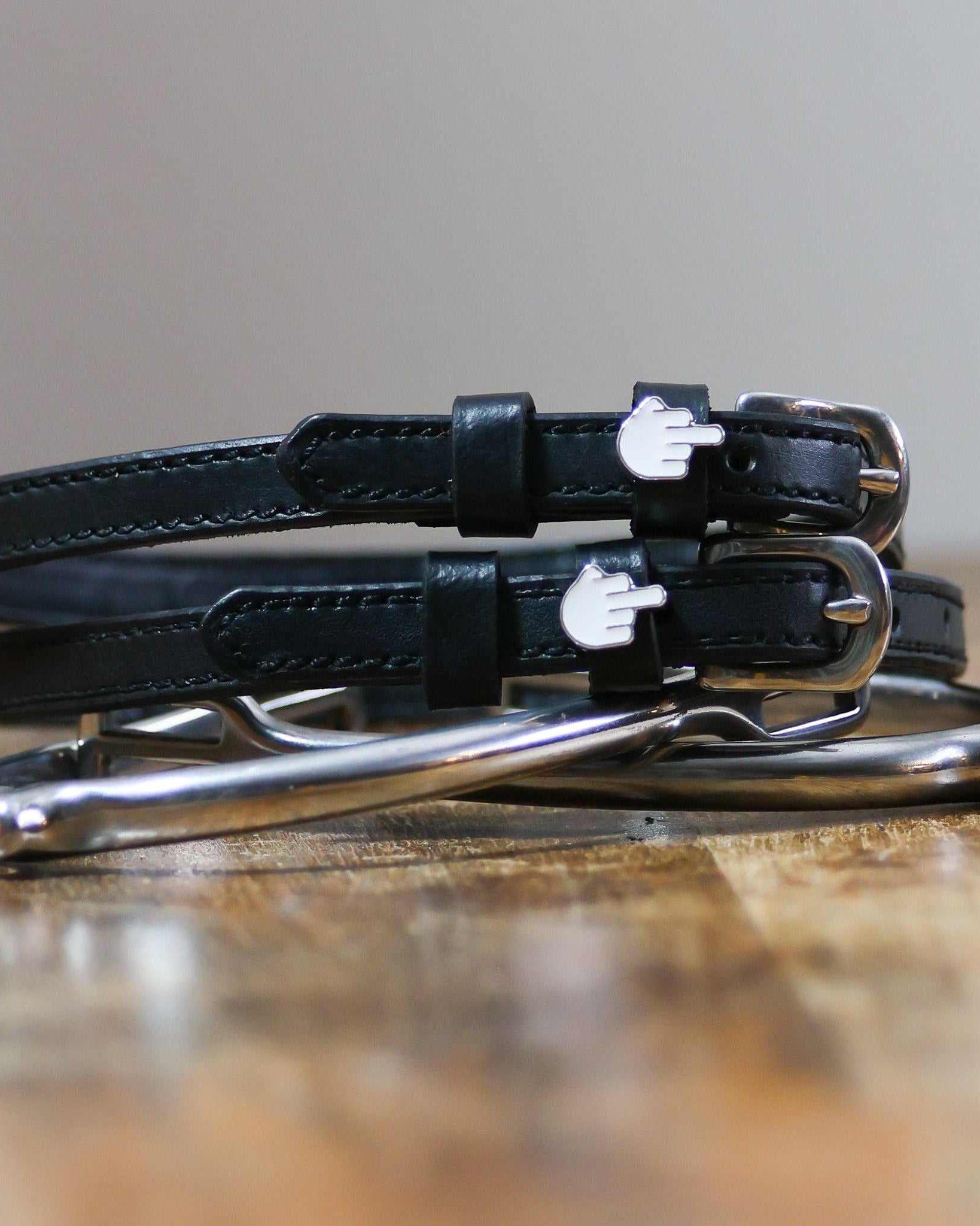 ManeJane Da Bird Spur Straps Spur Straps — black leather, non-stretch, hero image for English riders.