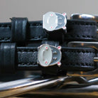 Black leather Hippo Face Spur Straps with stainless steel buckle and custom hippo charm