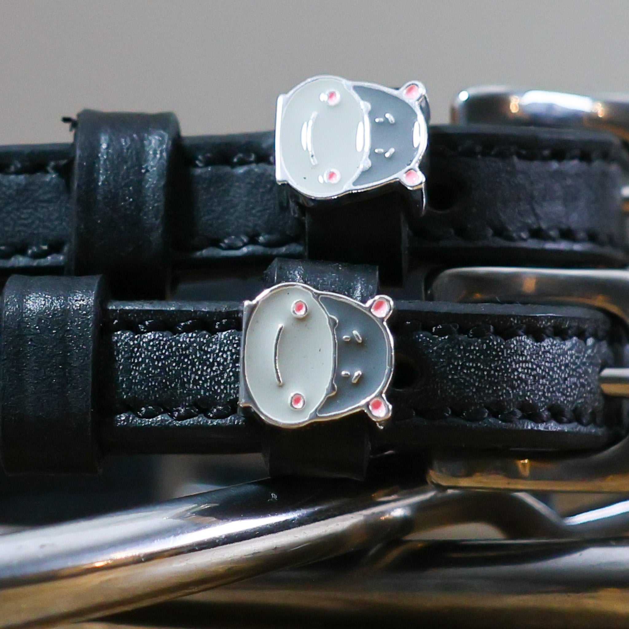 Black leather Hippo Face Spur Straps with stainless steel buckle and custom hippo charm