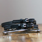 ManeJane Horse Shoe Party Spur Straps Spur Straps — black leather, non-stretch, hero image for English riders.