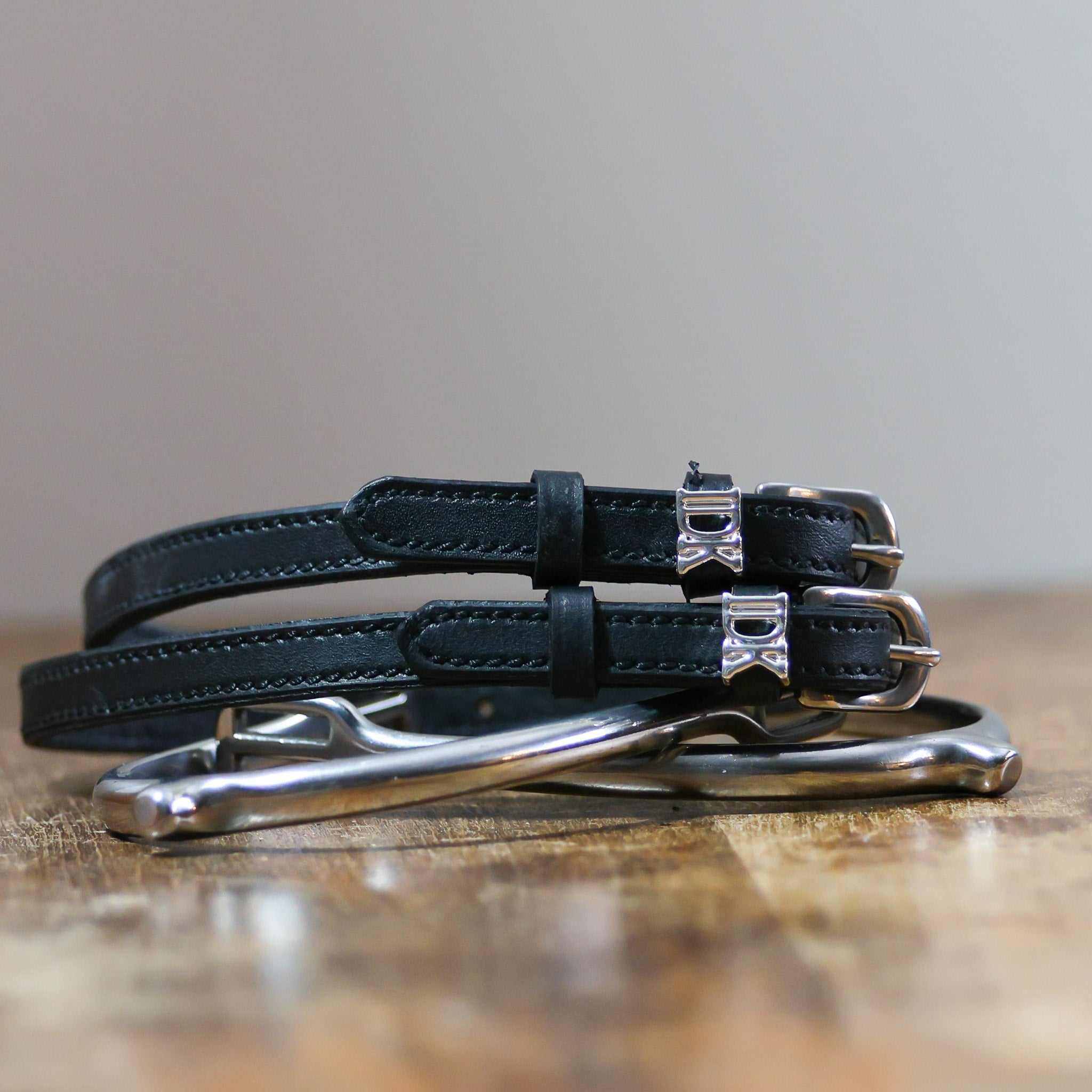 ManeJane I Don't Know ? Spur Straps Spur Straps — black leather, non-stretch, hero image for English riders.