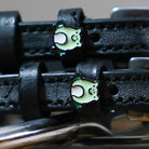 Black leather Frog Spur Straps with stainless steel buckle and custom frog charm