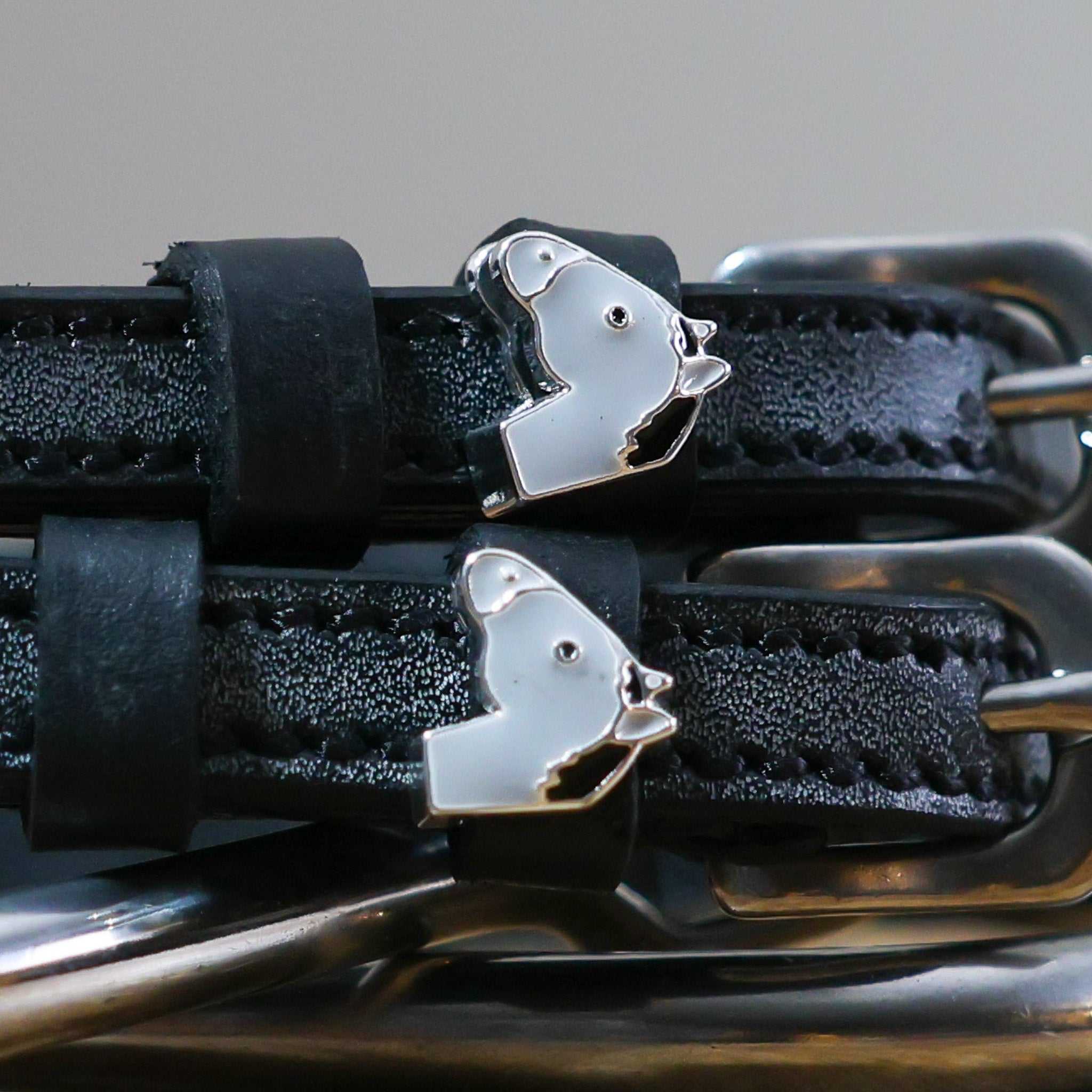 Black leather gray horse spur straps with stainless steel buckles and custom horse head charms