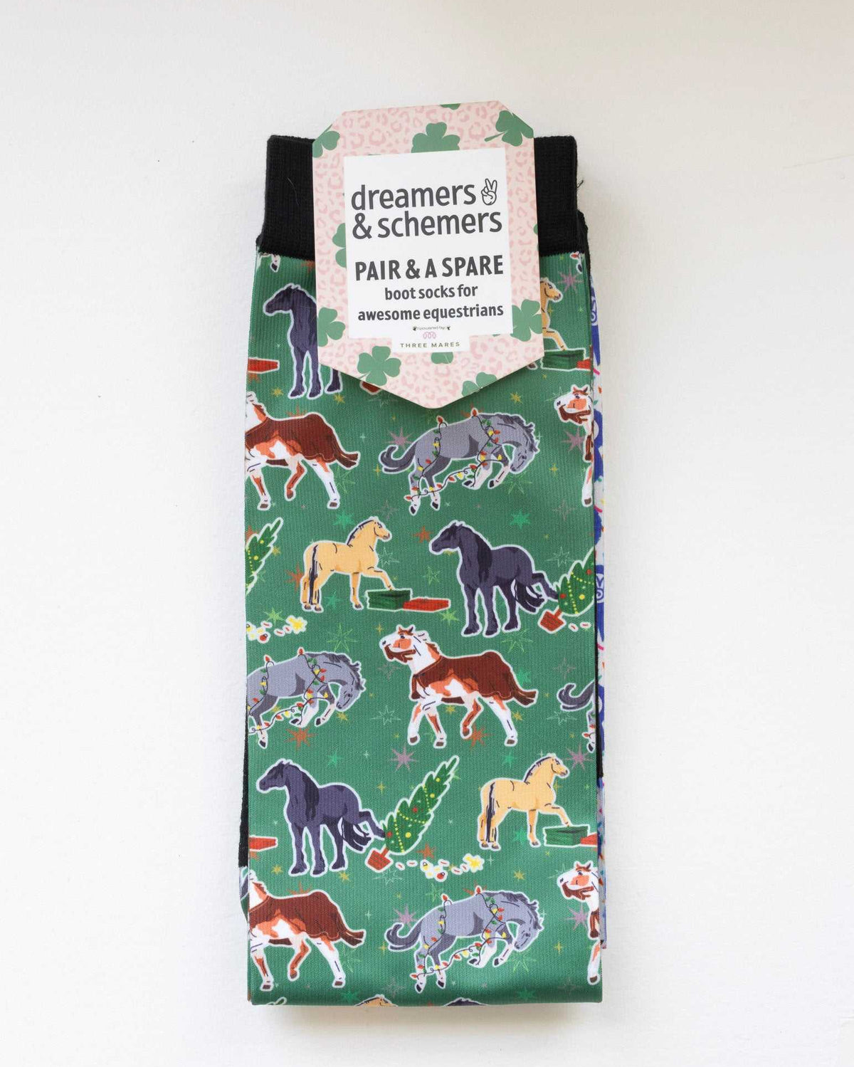 The Naughty List Pair & a Spare equestrian boot socks in their header card, by Dreamers & Schemers