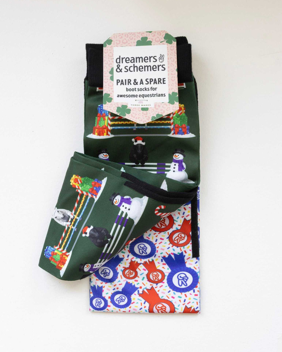Jump for Joy boot socks shown folded with the included spare sock and printed cuff detail