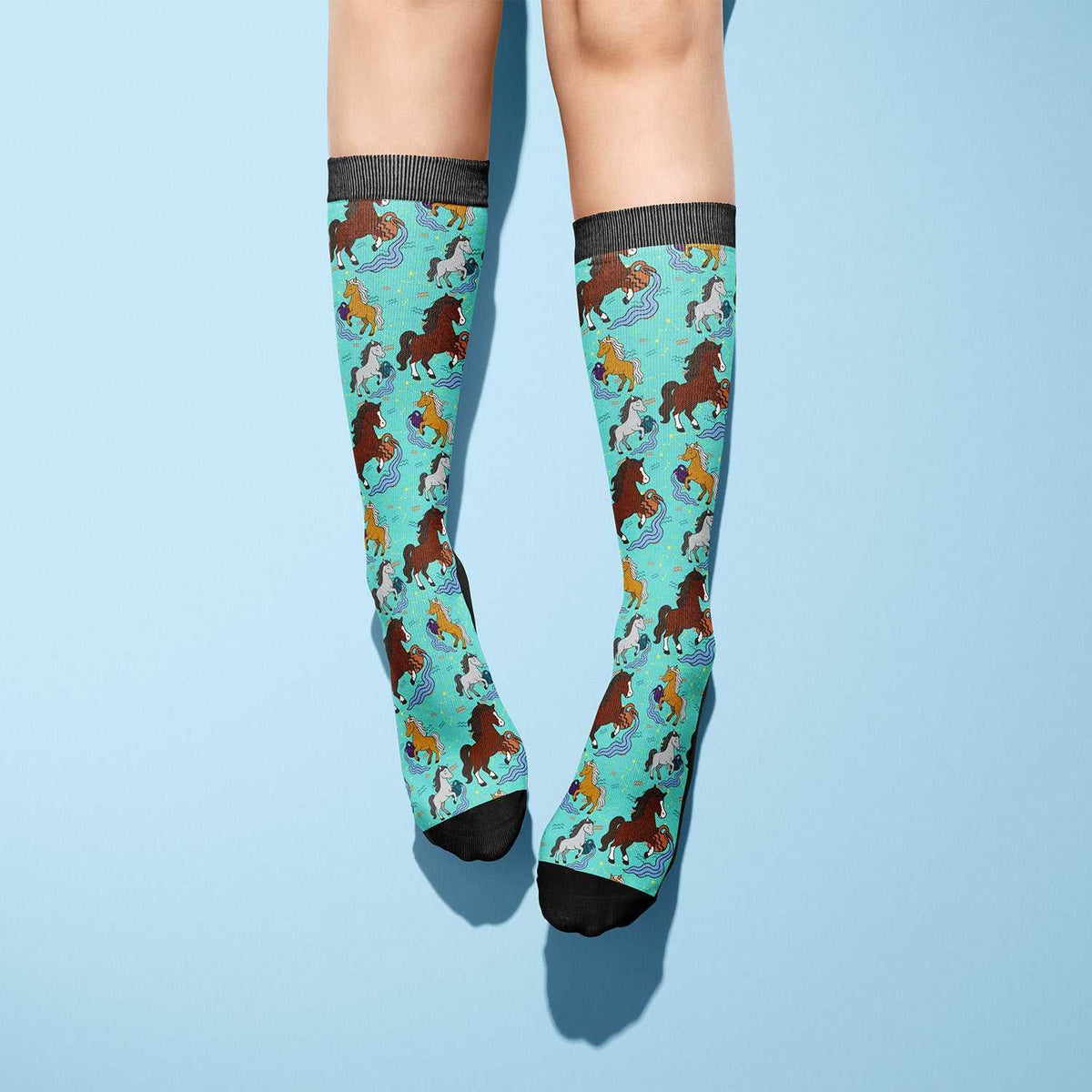 Aquarius-themed limited edition boot socks with colorful horse pattern on turquoise background