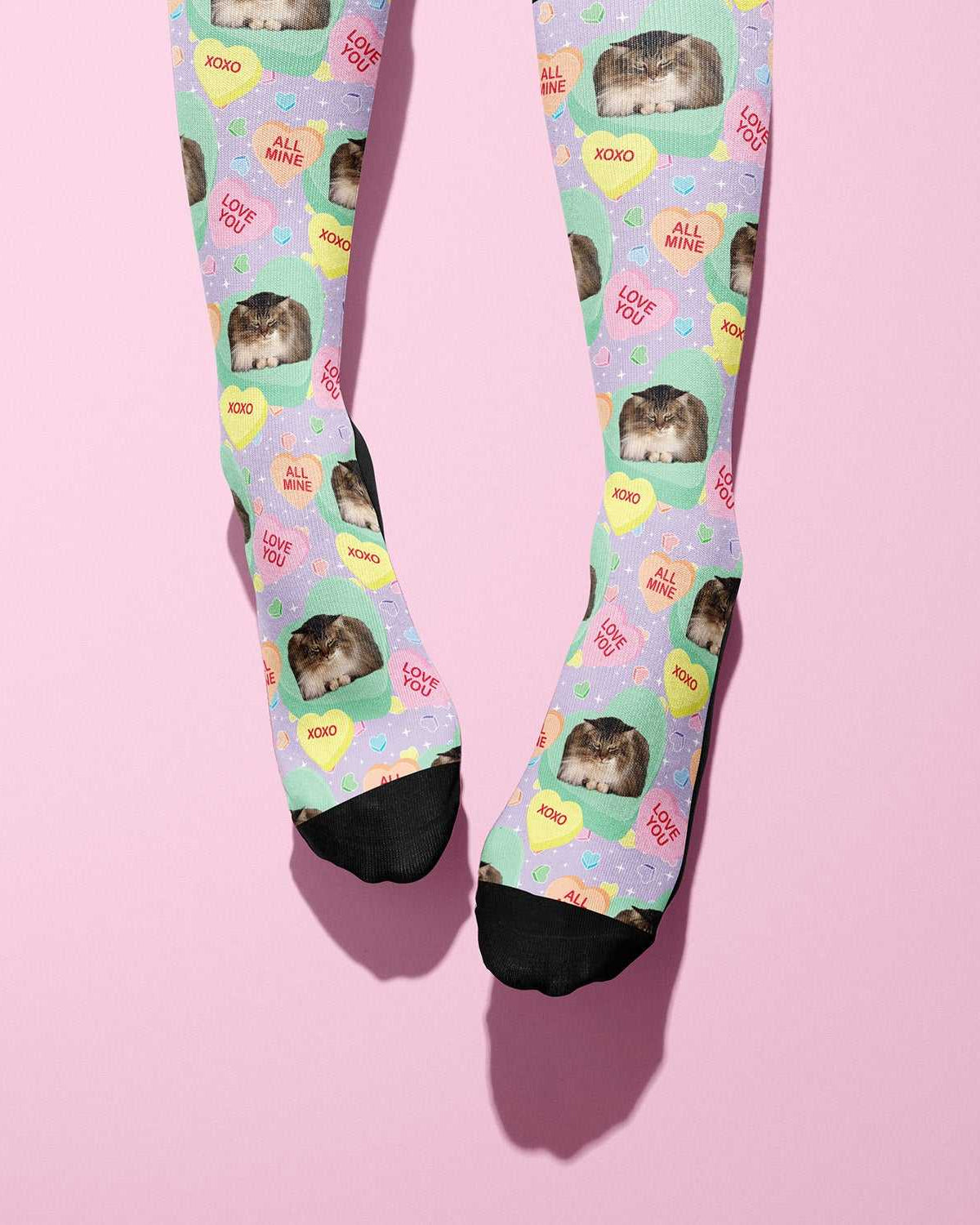Custom candy hearts boot socks with personalized photo design on pastel background