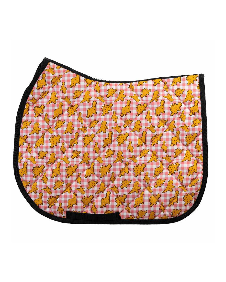 Dino Nuggies all-purpose saddle pad with dinosaur chicken nuggets, by Dreamers & Schemers